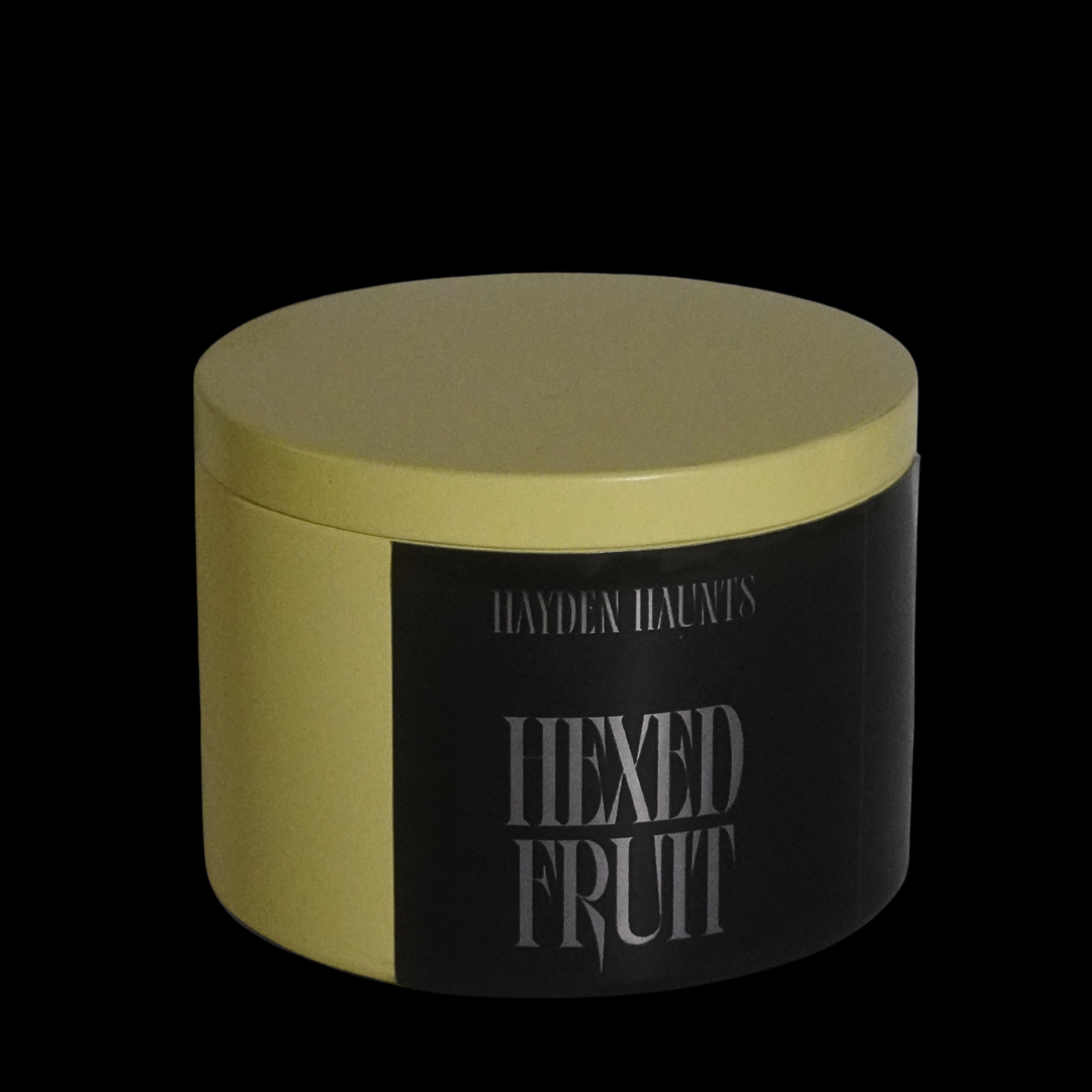 Round container with a black label featuring 'Hexed Fruit' on a black background